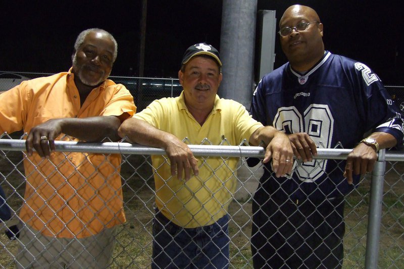 Image: Fenceline quarterbacks — Mr.Green, Larry Eubank and Larry Mayberry watch the game in Chilton