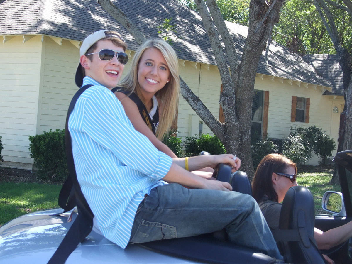 Image: Dan and Lexie — Dan Crownover and Lexie Miller in the parade.