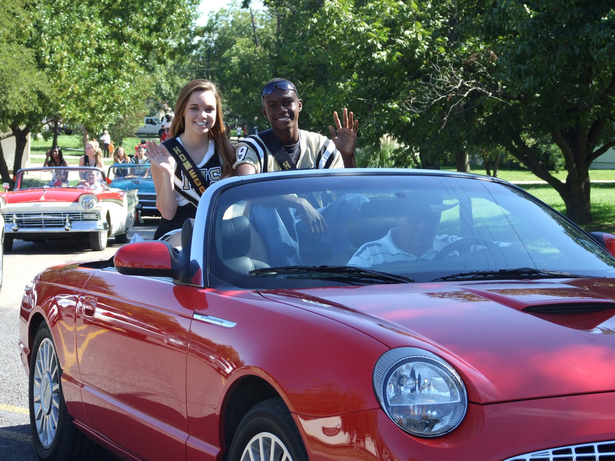 Image: Drew and Aaron — Drew Windham and Aaron Thomas in the convertible.