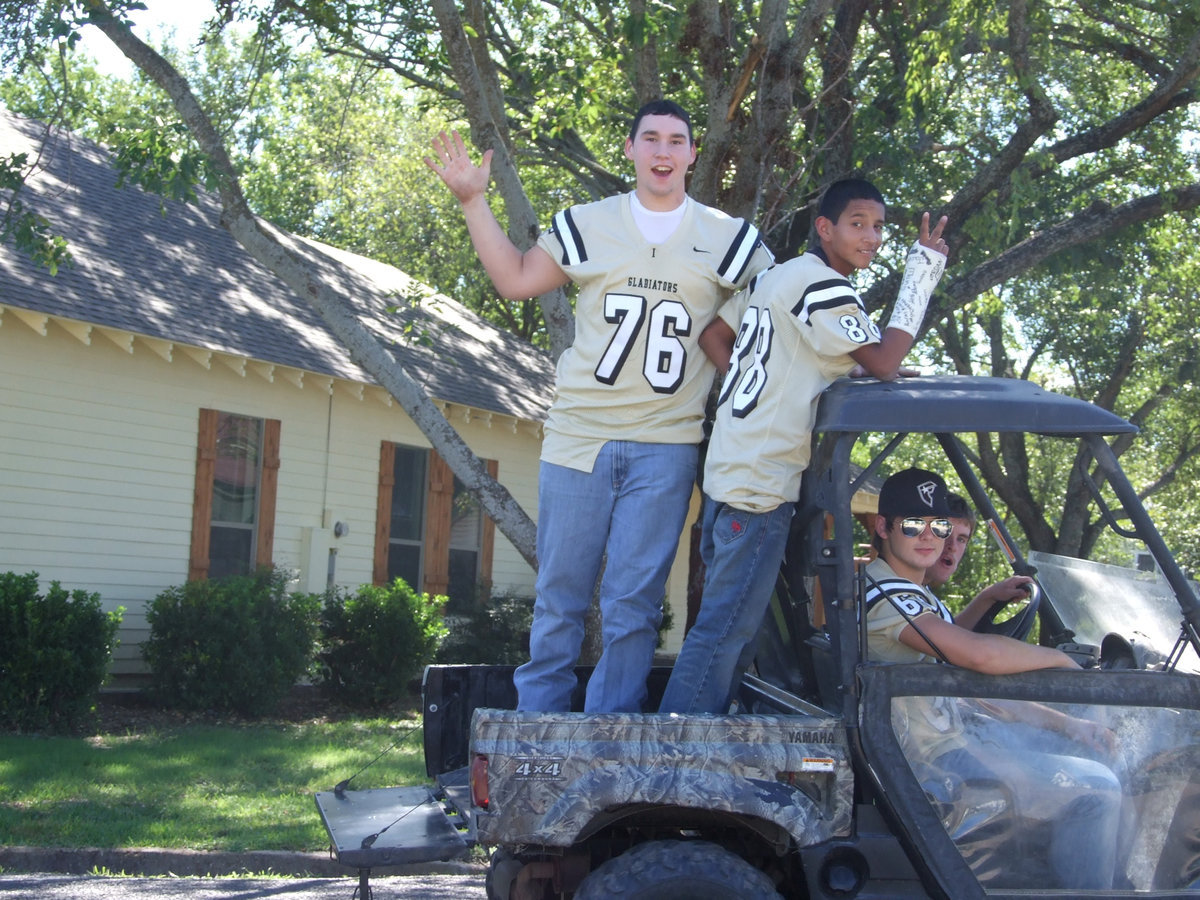 Image: Jeff and Eduardo — Jeff Claxton, Eduardo Garcia, Jonathan Nash and Ryan Ashcraft are in the parade.