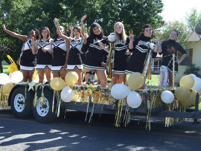 Image: JV and Varsity cheerleaders — Combine spirit and personality and you get this float of cheerleaders.