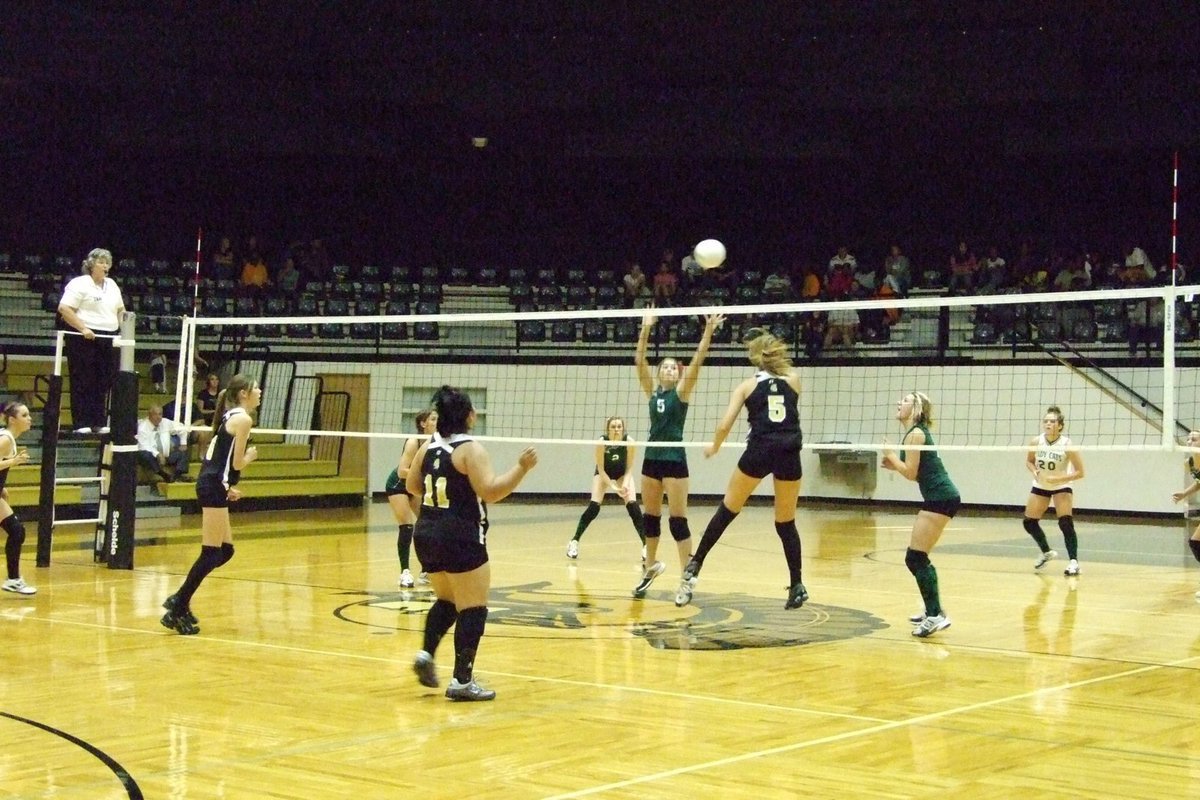 Image: Hit to Lady Cats — Both sides battle for the win.