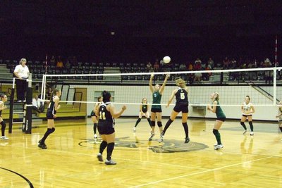 Image: Hit to Lady Cats — Both sides battle for the win.