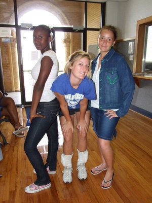 Image: Three Milford Cheerleaders — Ra’Tara Singleton, Laura Harvey and Genora Armstrong excited about the fundraiser.