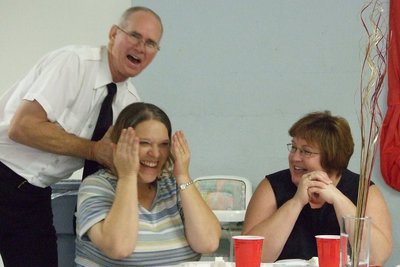 Image: Smiles and good food — Pastor Ronnie Dabney enjoys the luncheon with Kristi Souder and Karen Brummett.