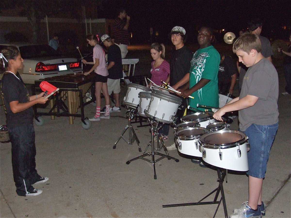 Image: The Gladiator Regiment Band pounds the pavement — The Gladiator Regiment Band rehearses their marching routine they’ll be performing at halftime during the Friday night football game in Malakoff.