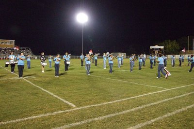 Image: All lined up — Everyone is invited to listen to the band during the halftime performances.