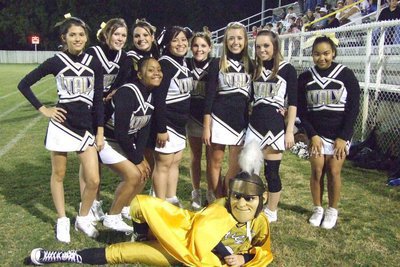 Image: Cheerleaders and Mascot — IHS Cheerleaders and mascot smile for the camera.