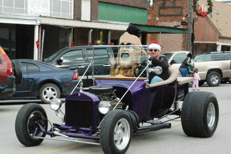 Image: Mascot On Wheels — The Italy Gladiator Mascot rides in style during the Christmas parade Saturday.