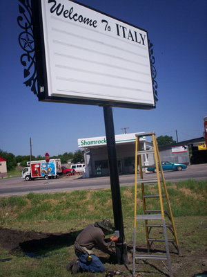 Image: Welcome To Italy — “Welcome To Italy,” is the headline across the top of the new marquee sign installed this morning at the corner of Hwy. 77 and Hwy. 34, across from Mansell’s Shamrock and Hobbs Feed &amp; Supply.