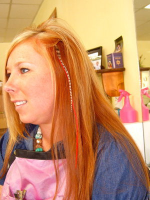 Image: Here is a side view of feathers in Heather’s hair.