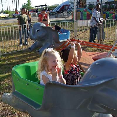 Image: Youngsters enjoying the elephant ride.