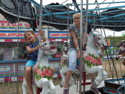 Image: Having fun on the merry-go-round.