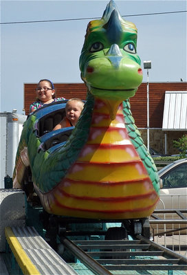 Image: The little ones take on the giant dragon roller coaster.