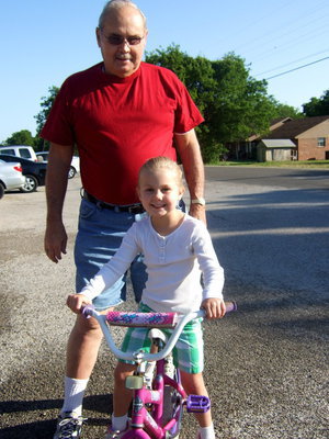 Image: Freddie Ivy and Gracie Upton. Gracie said, “I am really happy, i have been waiting a long time for a bike.”