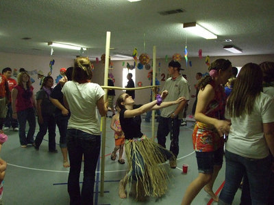 Image: Melissa  Smithey dresses for the luau and can limbo too.