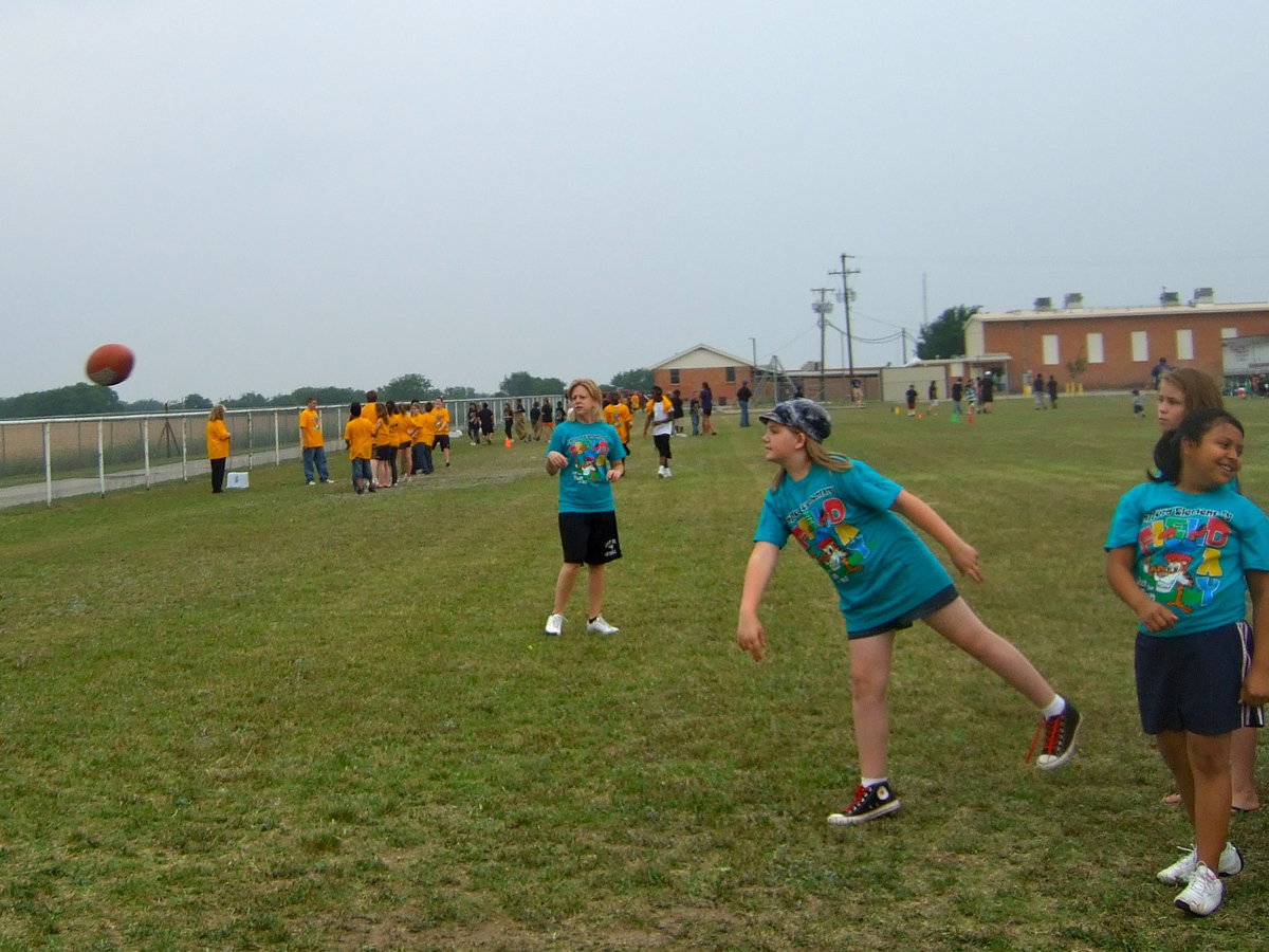 Image: This fifth grader had a good throw for the foot ball throw event.