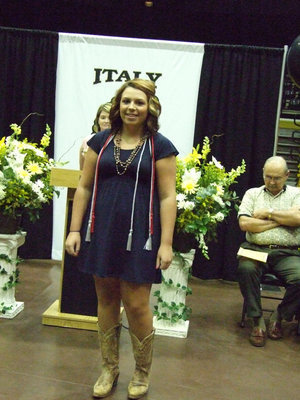 Image: Molly Haight receives a special red chord to reflect her Associate Degree at Navarro College.
