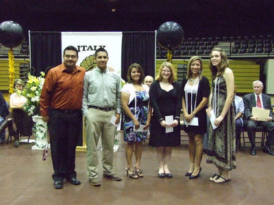 Image: Mr. Perez gives out Band Booster scholarships.