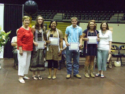 Image: The George E. Scott Memorial Scholarships went to four recipients this year.  (L-R) Wanda Scott, Melissa Smithey, Amber Mitchell, Ryan Ashcraft, Molly Haight and Diana Herrin.