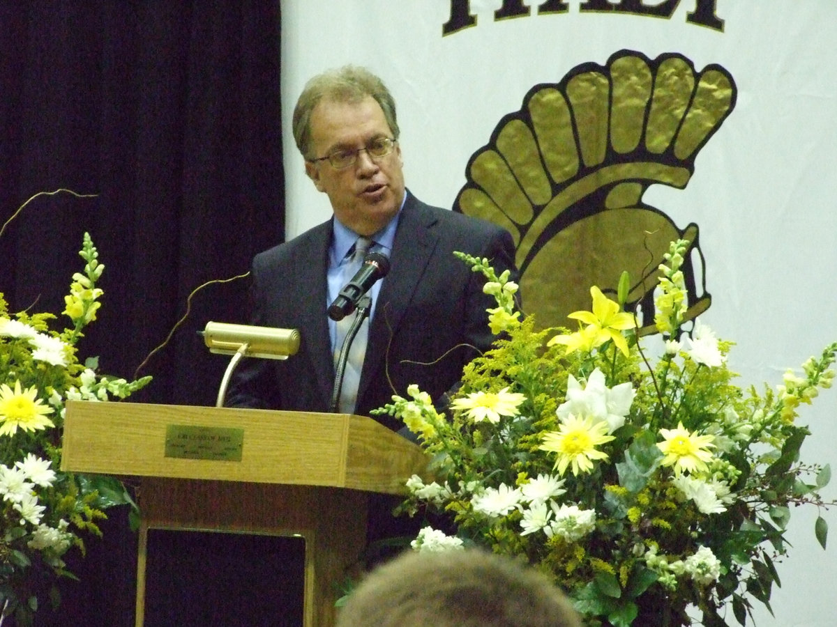 Image: New superintendent, Barry Bassett, addresses the seniors about change.