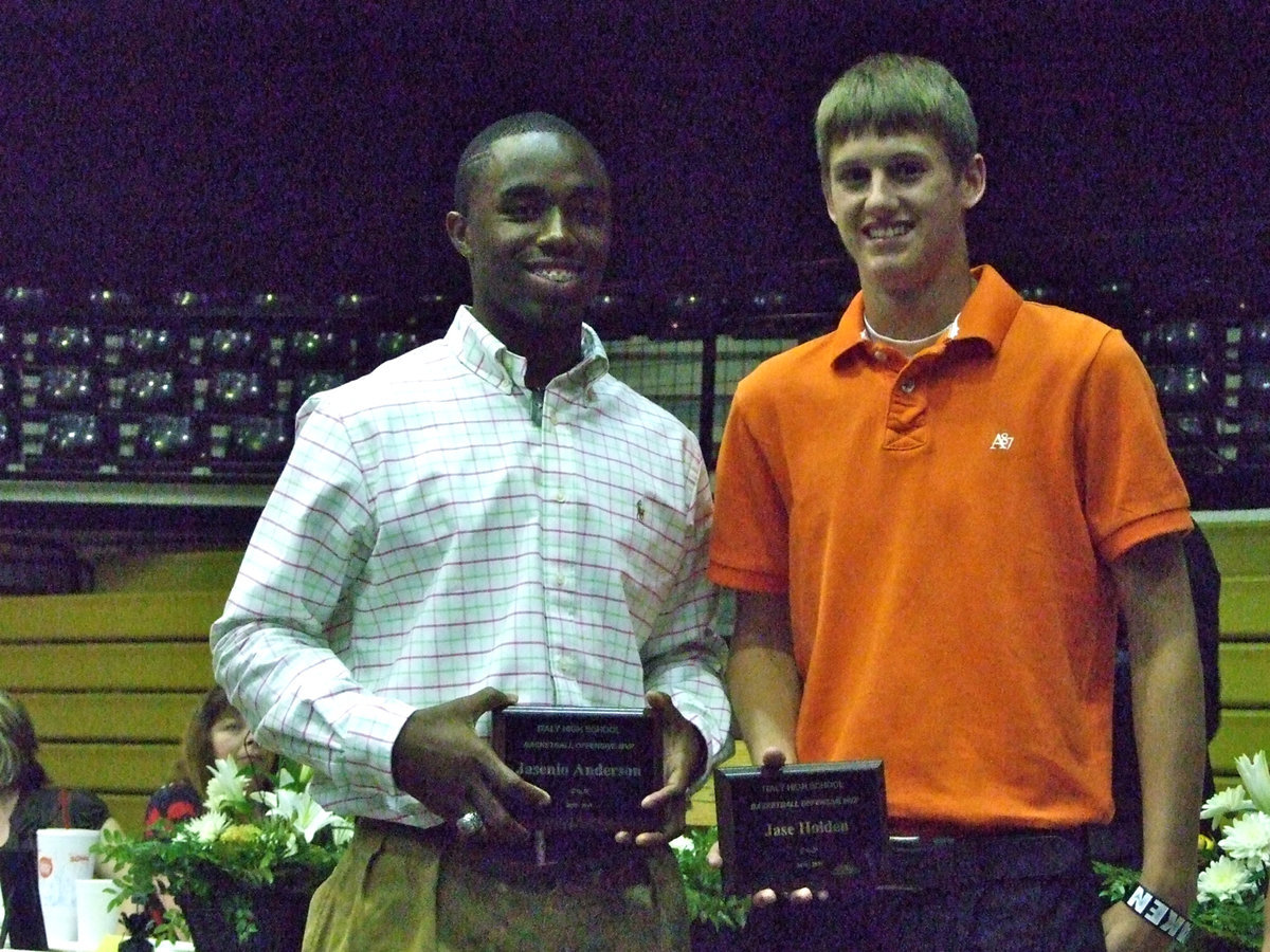 Image: Jase Holden receives Basketball Defensive MVP and Jasenio Anderson receives Basketball Offensive MVP.