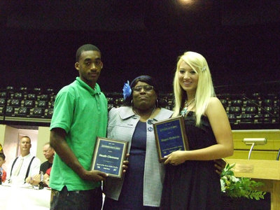 Image: Brenda Davis was pleased to give Heath Clemons and Megan Richards the Keith Davis award.