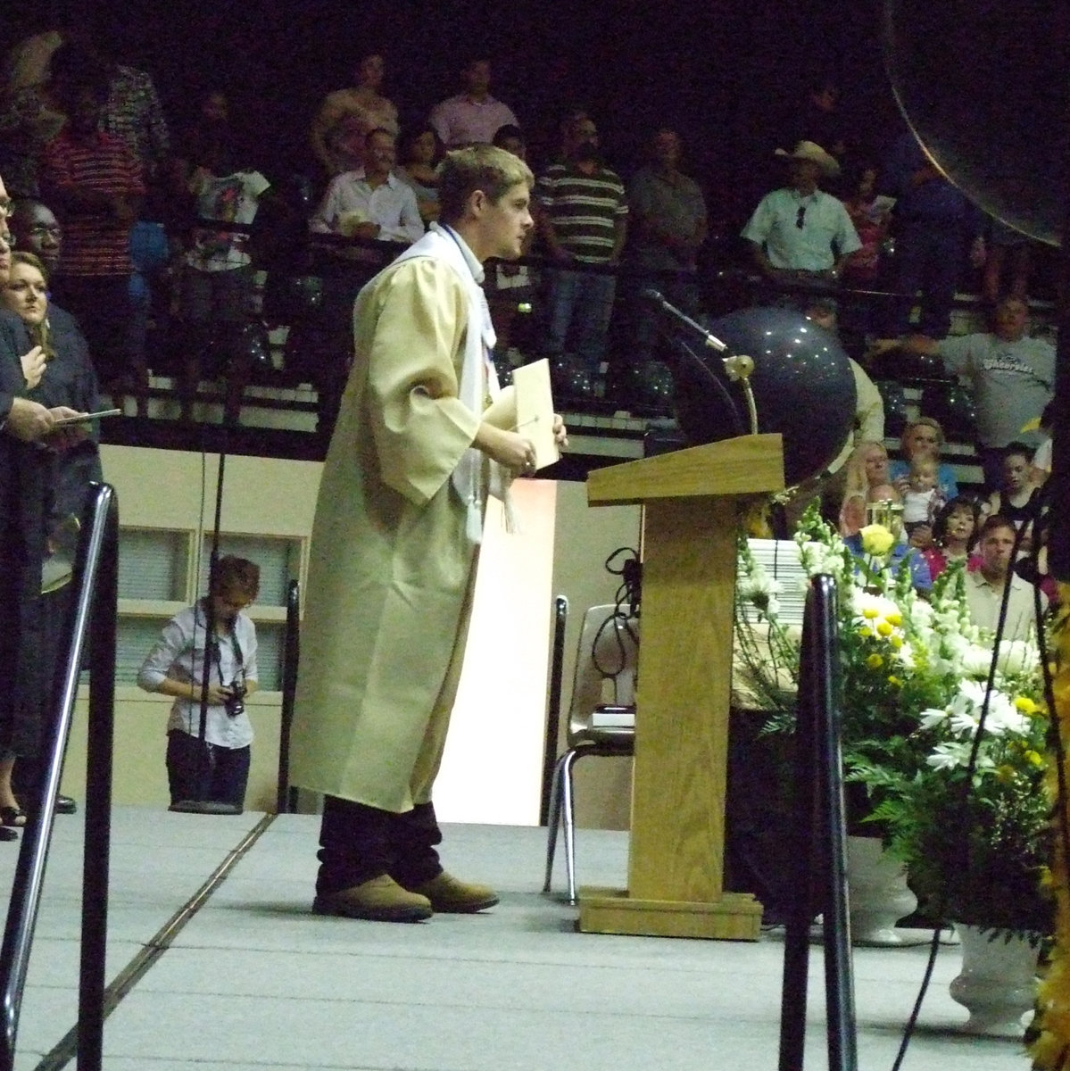 Image: Ryan Ashcraft leads the audience in the Pledge.