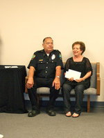 Image: Police Chief Johns and his wife Vicky Johns listening to all the nice things that were being said about the Chief.