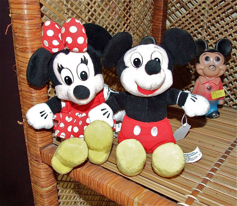 Image: Minnie and Mickey Mouse collectible dolls.