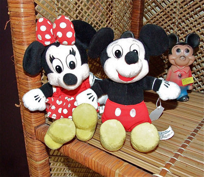Image: Minnie and Mickey Mouse collectible dolls.