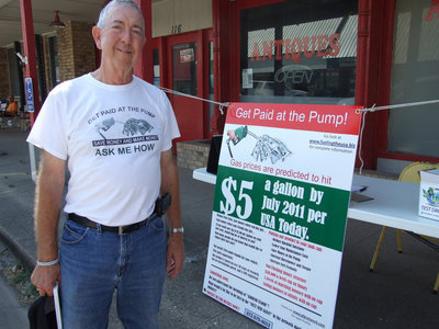 Image: Smilin’ Sandy Westbrook will help you “get paid at the pump”.  He has Envirotabs which are green tech products that help save on fuel costs.  The fuel helpers can be used on diesel, unleaded gas, ethanol, airplanes and lawn mowers.  Just ask him.