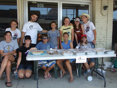 Image: Central Baptist youth were having a bake sale on Saturday to help with this summer’s camp costs.