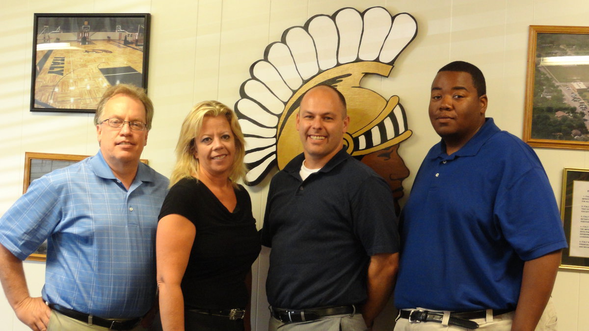 Image: Barry Bassett, superintendent, with staff — Sharon Davis, high school counselor; Lee Joffre, junior high/high school principal; and Jason Miller, elementary school principal.