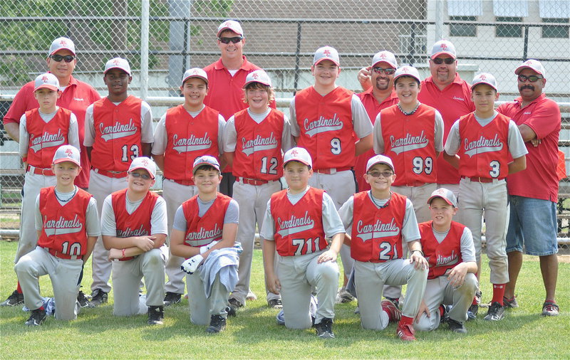 Image: The 2011 Waxahachie Cardinals 12u Boys Select Baseball Team. Back row: Paul Hernandez, head coach Paul Schmidt, Jeff Sutton, Wynne Stallcop, Albert Garcia, Jr. Middle row: Jacob “Snake” Hernandez(1), Brandon “Kung-Fu Panda” Gibson(13), Andrew “Teddy Bear” Sepeda(32), Matt “Girl Scout” Moore(12), Evan “Monstar” Crawford(9), Emiliano “Gummy Bear” Gomez(99) and Michael Barron(3). Bottom row: Austin “Slimp” Schmidt(10), Austin “AAA Armadillo” Stallcop(5), Alex “Smalls” Hughes(7), James “Slurpy Big Gulp” Hernandez(711), Eli “The Prophet” Garcia(21) and Jacob “The Menace” Bailey(41). Not pictured are: Coach Jamie Hernandez and Colin “Lil’ Cat” Williams, a left-handed pitcher from Katy, Texas who will be joining the Cardinals in the World Series.