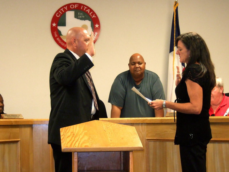 Image: Police Chief Diron Hill being sworn into office.