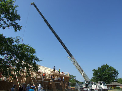 Image: Help from the crane was needed for these construction workers.
