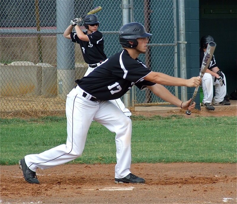 Image: Brandon Souder(17), shows bunt to Alvarado’s infield.