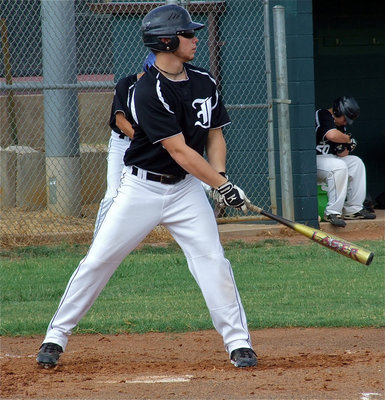 Image: Reece Marshall(3) settles in at the plate.