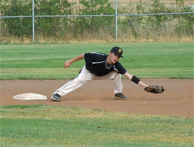 Image: Caden Jacinto(5) demonstrates the his ability to cover second base on the throw-down.