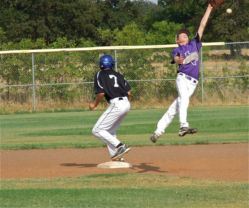 Image: Brett Pickard(7) steals second base against Alvarado.