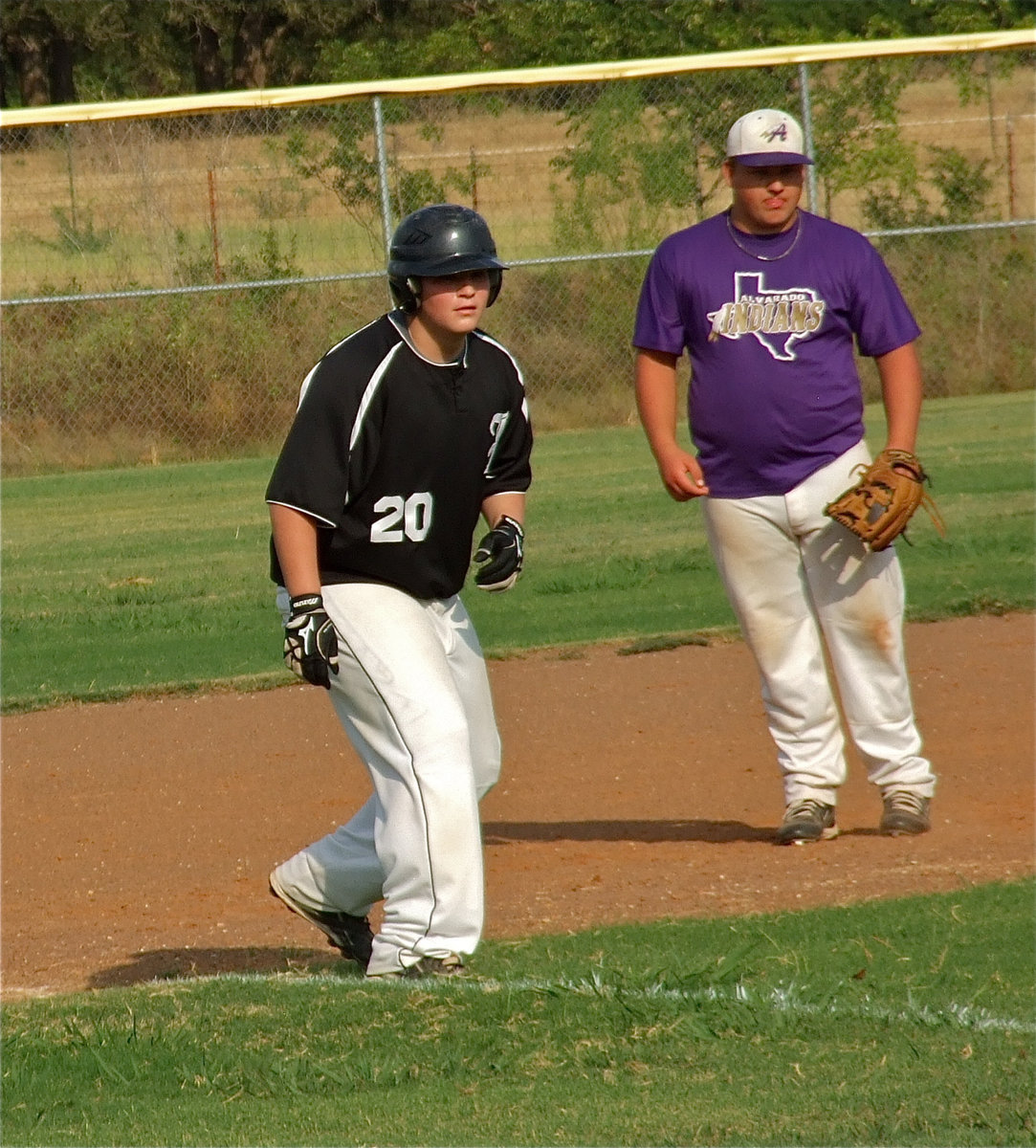 Image: John Byers(20) looks for an opportunity to steal home.