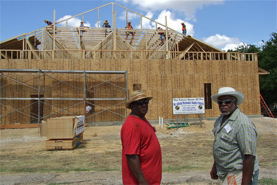 Image: Kenneth Copeland, and, Ervin Green, Sr., are proud of the progress of the new church.