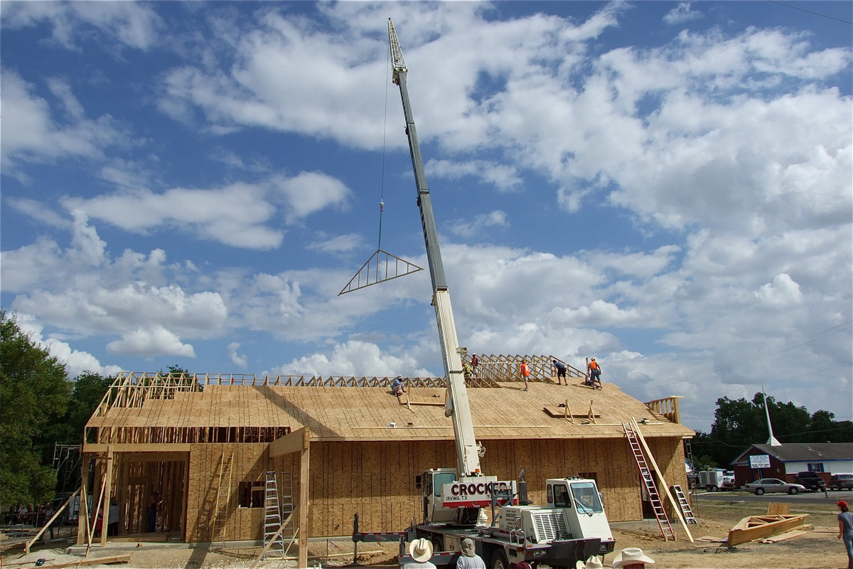 Image: A wide shot of the church construction in process.