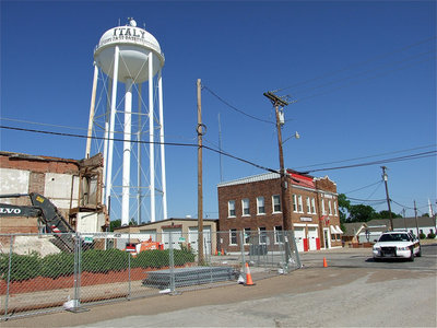 Image: View of community center demolition along Harpold Street.