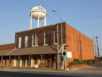 Image: The previous community center watched over by the Italy water tower.