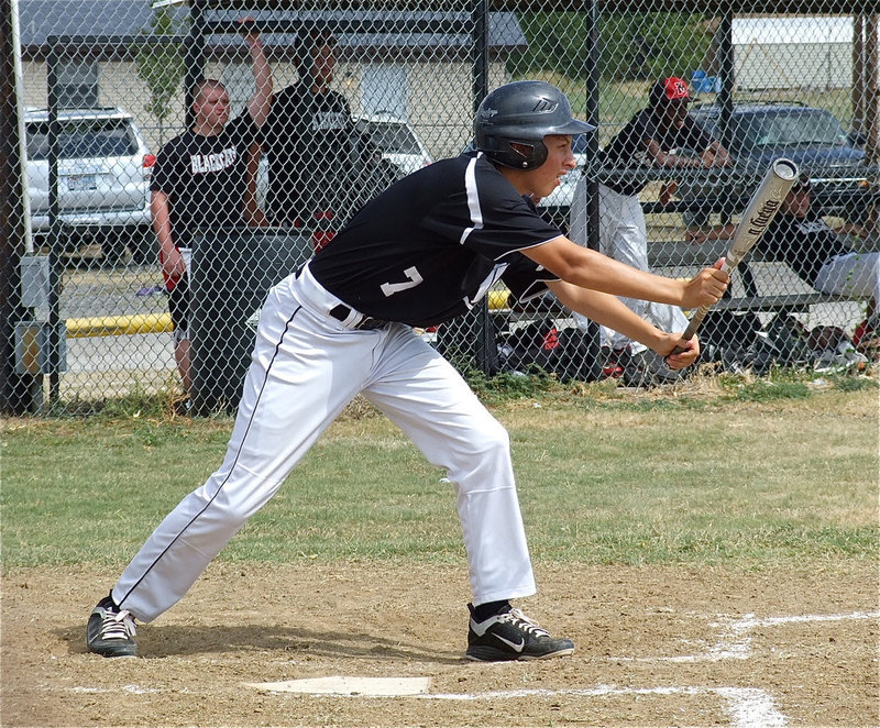 Image: Brett Pickard tries to bunt his way on base for Italy.