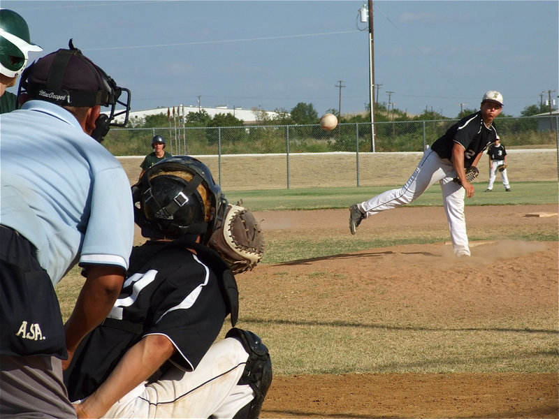 Image: Kyle Jackson(2) pitches a strike while catcher, Brandon Souder has the best seat on the diamond.