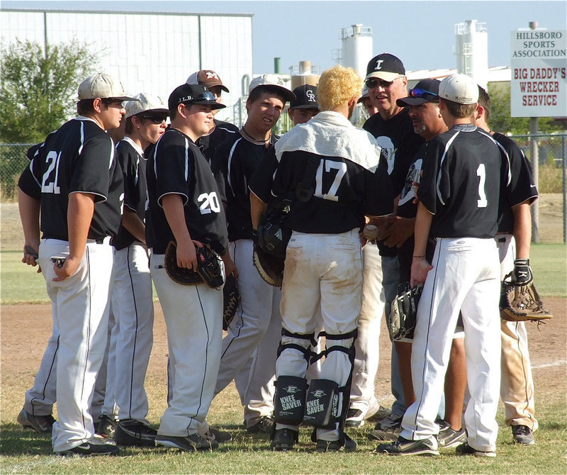 Image: When Brandon Souder(17) talks the team listens. Maybe Souder will grow up to be a stock brocker?