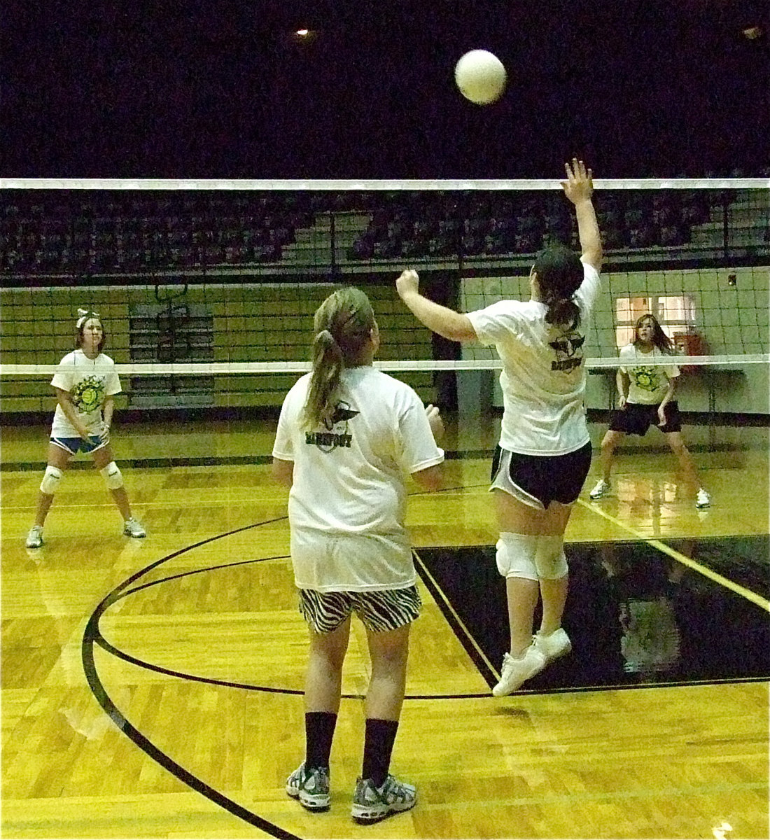 Image: Christy Murray looks on as Bailey DeBorde returns fire.